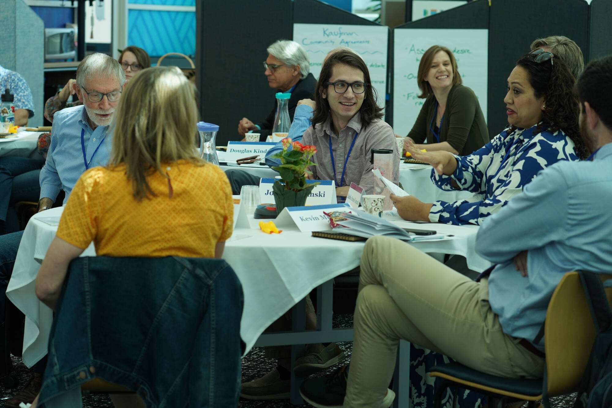Participants interact at a photovoice event